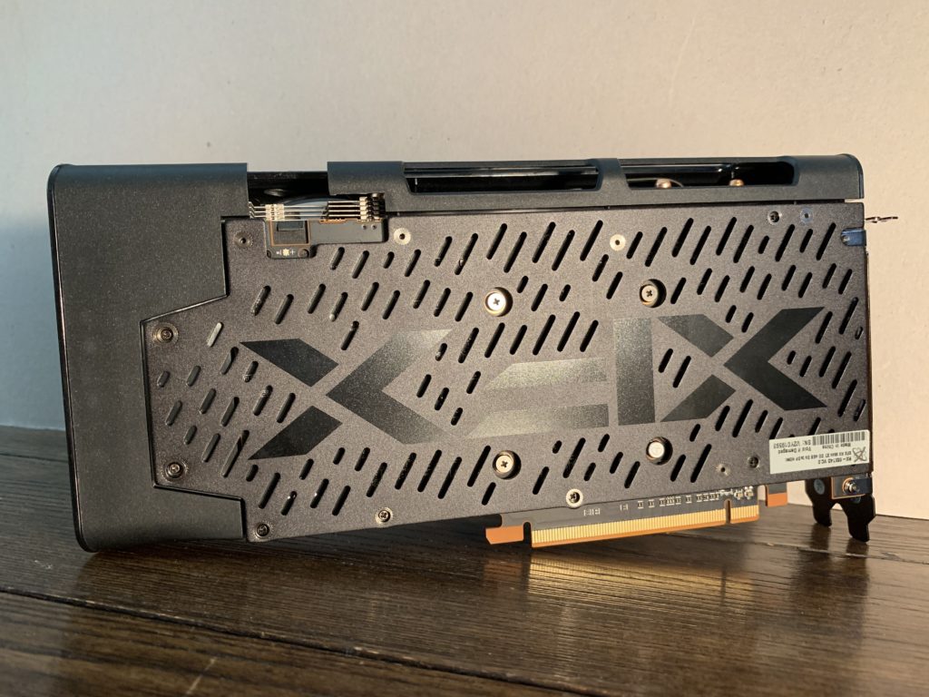 XFX Radeon RX 5500 XT THICC II Pro video card backside on desk