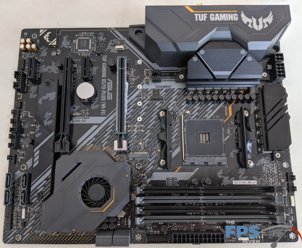 ASUS TUF GAMING X570 PLUS (WI-FI) Motherboard Review Motherboard On Table Laying Flat 