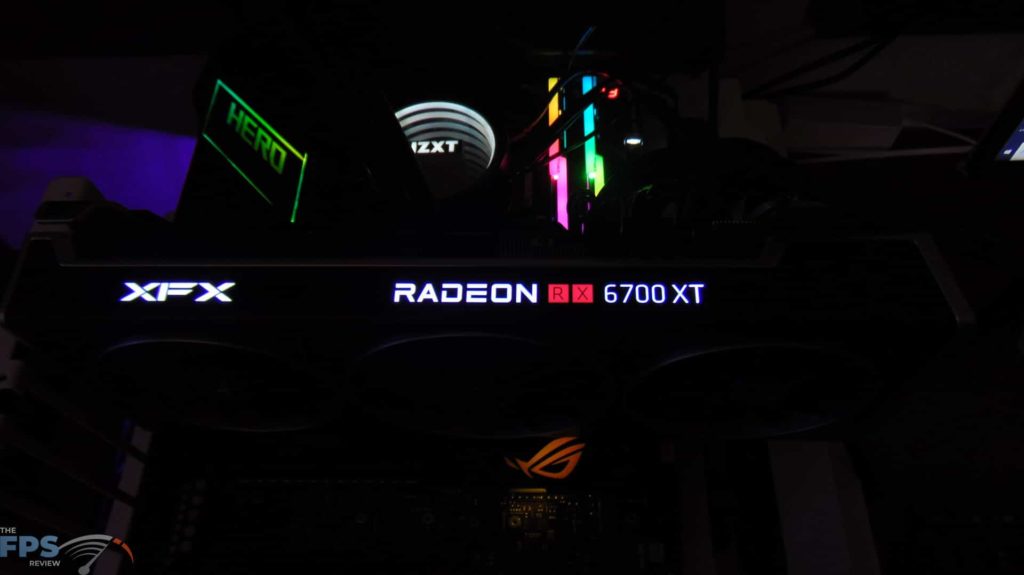 XFX SPEEDSTER MERC 319 BLACK AMD Radeon RX 6700 XT top view rgb lighting in the dark