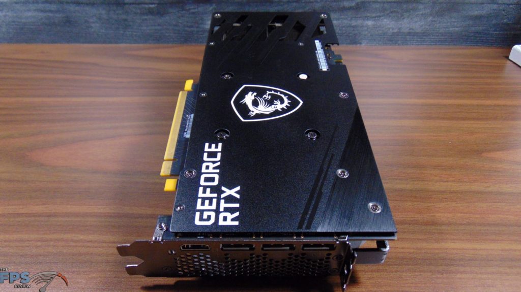 MSI GeForce RTX 3050 GAMING X Video Card Laying On Table Bottom Top End View