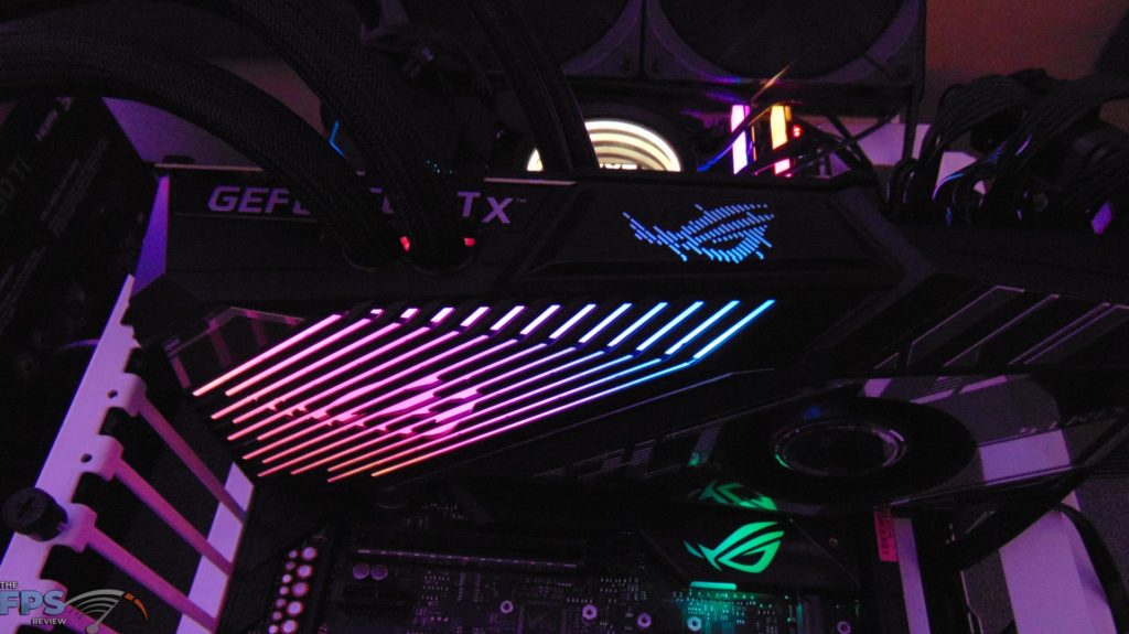 ASUS ROG STRIX LC RTX 3080 Ti O12G GAMING video card installed in computer running with RGB lit up on video card
