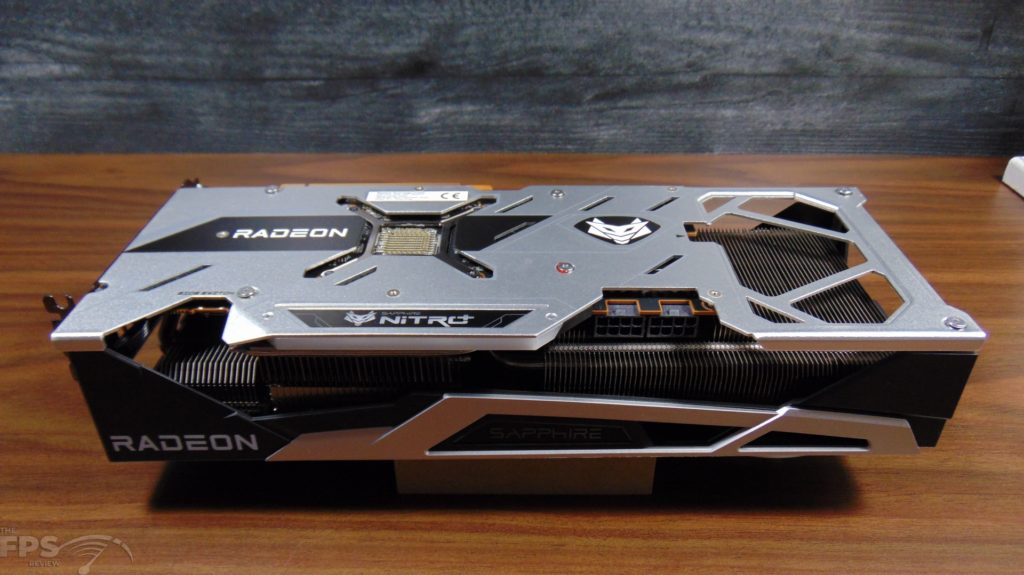 SAPPHIRE NITRO+ AMD Radeon RX 6700 XT GAMING OC Video Card Back View Laying On Desk Upside Down