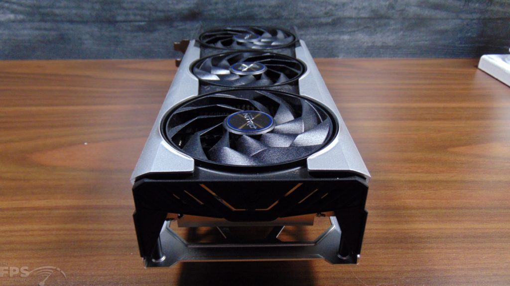 SAPPHIRE NITRO+ AMD Radeon RX 6700 XT GAMING OC Video Card Top View Laying On Desk Toward Back End