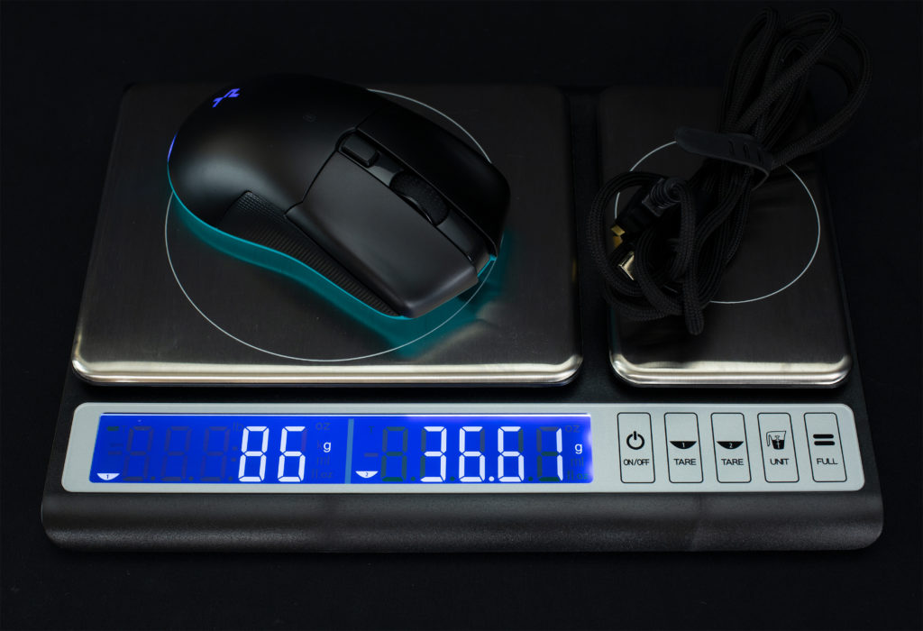 DeepCool MG510 Wireless Gaming Mouse and cable on scale