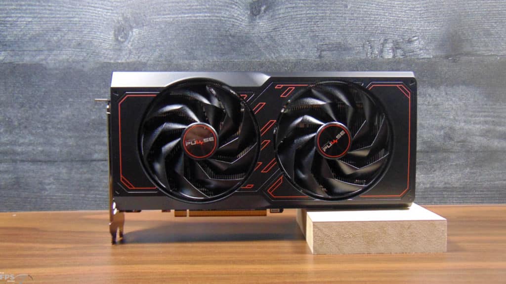 SAPPHIRE PULSE Radeon RX 7600 XT 16GB Video Card Sitting Up On Desk Front Side